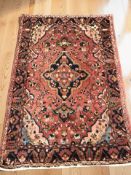 A Hamadan rug, North-West Iran, 207 cm x 137 cm.