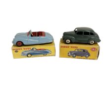 Two Dinky Toys die cast vehicles : 106 Austin Atlantic Convertible and 152 Austin Devon Saloon,