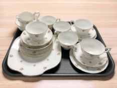 Twenty one pieces of Crown Staffordshire tea china.