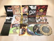 Vinyl LP records including Lynyrd Skynyrd, AC/DC, Guns N' Roses, Van Halen, Aerosmith, etc.