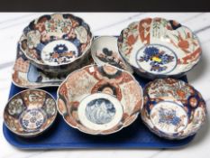 A group of antique Japanese imari bowls.