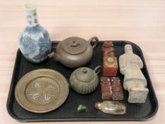 A group of Chinese wares including a blue and white vase depicting a landscape,