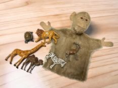 An early 20th century Steiff mohair monkey hand puppet, height 22 cm, together with a group of J.