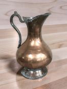 A 19th century copper plated water jug, height 38 cm.