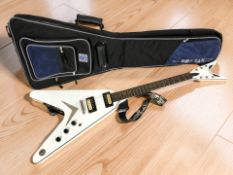 A Dean flying-V electric guitar, with carry bag.