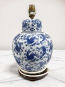 A Chinese blue and white porcelain ginger jar converted to a table lamp, overall 33 cm high.