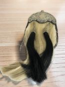 A sporran with plated mounts, overall length 46 cm.