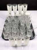 Crystal drinking glasses including a set of four Royal Doulton champagne flutes,