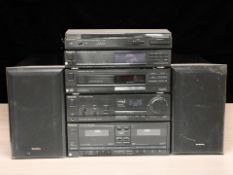 A Technics hi-fi system comprising turntable SL-J100R, stereo tuner ST-X930L, CD player SL-PJ25,