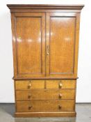 A Victorian oak linen press, 130 cm x 60 cm x 212 cm.