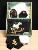 A group of naval uniforms.