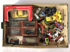 Boxed and unboxed die cast cars including Bburago, Matchbox, etc.