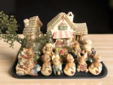 A collection of Pendelfin rabbits.