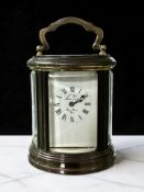 A French brass carriage timepiece signed 'L'Epee', eleven jewel movement with platform escapement,