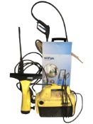 A Karcher window vacuum and a Nilfisk compact pressure washer.