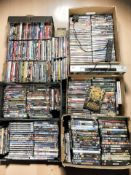 A large quantity of DVDs and a DVD player.