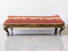 A late Victorian beech rectangular stool on pad feet, length 110 cm.