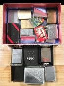 A group of Zippo and other lighters, plated cigarette case, etc.