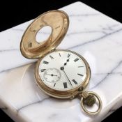 A 9ct gold half-hunter pocket watch, with unsigned white enamel dial,