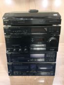 A Technics hi-fi system comprising automatic turntable SL-J110R, stereo tuner ST-X990L,