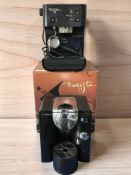 A Bosch coffee machine and a Starbucks Barista coffee machine with box.