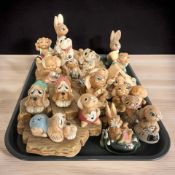 A collection of Pendelfin rabbits.