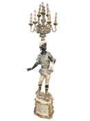 A 20th century painted wooden Blackamoor figural lamp, height 210 cm.