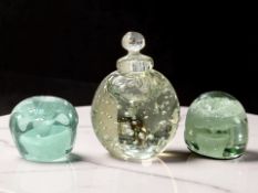 Two Victorian Sunderland green glass dumps with flower sulphide inclusions, tallest 7 cm,