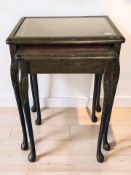A nest of two beech tables with leather inset tops, width 42 cm.
