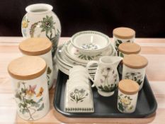 A collection of Portmeirion Botanic Garden dinner plates, kitchen storage jars, toast rack, vase,