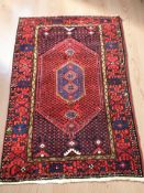A Hamadan rug, North-West Iran, 201 cm x 135 cm.