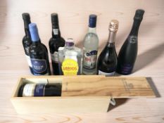 Assorted modern bottles of alcohol including champagne, Taylor's vintage port, Graham's port,