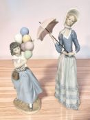 A Lladro figure of a lady with parasol, height 32 cm, and a further figure of a lady with balloons.