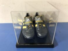 A pair of Adidas rugby boots,