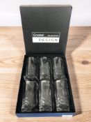 A cased set of lead crystal tumblers.