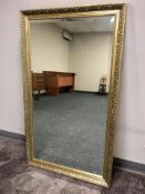 A contemporary gilt mirror, 117 cm x 69 cm.