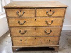 A George III oak five drawer chest on bracket feet, 93 cm x 47 cm x 94 cm.