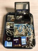 A collection of costume jewellery, dress rings, simulated pearls, wristwatch,