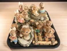 A collection of Pendelfin rabbits.