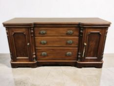 A late Victorian mahogany inverted break-front sideboard, 180 cm x 58 cm x 88 cm.