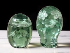Two Victorian Sunderland green glass dumps with flower sulphide inclusions, tallest 14.5 cm.