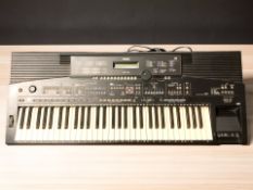 A Yamaha PSR-1700 digital keyboard.