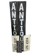 Two painted wooden antiques signs, length 150 cm, plus three others.