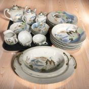 Approximately thirty six pieces of Japanese export tea and dinner china.