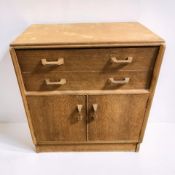 A 1950's G-Plan Brandon oak cabinet, 77 cm x 47 cm x 85 cm.