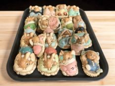 A collection of Pendelfin rabbits.