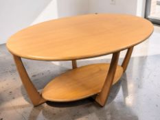 A modern G-Plan teak oval two tier coffee table, width 100 cm.