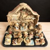A collection of Pendelfin rabbits.