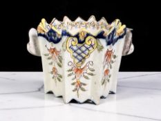 A French Desvres Rouen Faience polychrome painted pot,