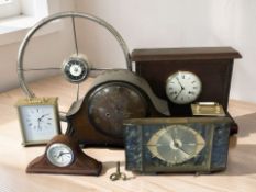 A group of mantel clocks and timepieces,